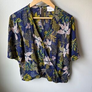 Cross front floral top with snap